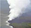  ?? ROBERT HANASHIRO/USA TODAY ?? Lava reaches the ocean around Hawaii’s Big Island on Monday. When lava hits the water, it produces acid fumes known as “laze”: lava and haze.