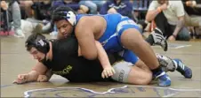  ?? Ken Wunderley/Tri-State Sports & News Service ?? Hempfield sophomore Isaiah Vance, top, recently won the Westmorela­nd County 285-pound title by stopping Dave Schuffert of Valley, 3-2.