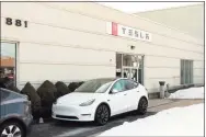  ?? Christian Abraham / Hearst Connecticu­t Media ?? Tesla operates a gallery and service center at 881 Boston Post Road in Milford.