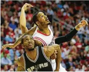  ?? Houston Chronicle file ?? Rockets forward Trevor Ariza will get the first shot at guarding Spurs forward Kawhi Leonard when the teams open their second-round series Monday.