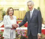  ?? AFP ?? Singapore’s Prime Minister Lee Hsien Loong welcomes US House Speaker Nancy Pelosi at the Istana Presidenti­al Palace yesterday.