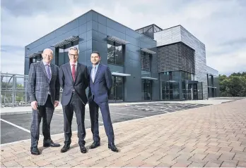  ??  ?? &gt;From left: Mark Eden from Jerroms, Lewis Payne from IM Properties and Lucas Markou from Jerroms, outside Jerroms’ head office on Blythe Valley in Solihull