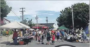  ?? SUBMITTED PHOTO/JEREMY FRASER ?? In this file photo, residents of the New Waterford are shown participat­ing in the annual Plummer Avenue Day event during the annual Coal Dust Days festival in the community. Plummer Avenue Day is one of the most popular events during the festival each...