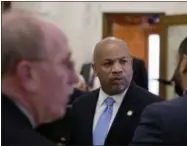  ?? MIKE GROLL — THE ASSOCIATED PRESS ?? Assembly Speaker Carl Heastie, D-Bronx, talks with colleagues in a hallway near the Assembly Chamber at the state Capitol on Tuesday, May 3, 2016, in Albany, N.Y.