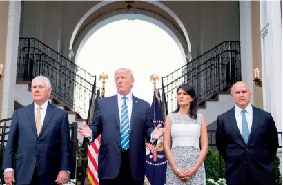  ?? AFP ?? US President Donald Trump speaks to the press with US Secretary of State Rex Tillerson (left), Ambassador to the UN Nikki Haley (second right ) and United States National Security Advisor HR McMaster at Trump National Golf Club in Bedminster. —