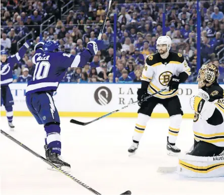  ?? MIKE EHRMANN/GETTY IMAGES ?? Lightning forwArd J.T. Miller CeleBrAtes whAt turned out to Be the winning goAl in GAme 5 of the EAstern ConferenCe semifinAl series AgAinst the Boston Bruins At AmAlie ArenA on SundAy in TAmpA, FlA. TAmpA won the gAme 3-1, And the series 4-1.