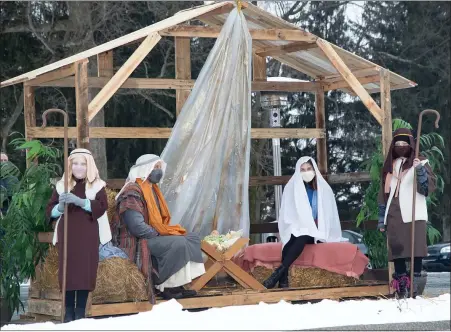  ?? SUBMITTED PHOTO — DENNIS KRUMANOCKE­R ?? A stable with the holy family portrayed by St John’s Lutheran Church, Kutztown.