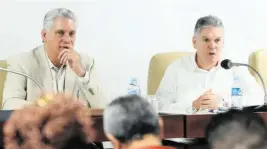  ?? GRANMA ?? Cuban leader Miguel Díaz-Canel, left, and former minister of economy Alejandro Gil.