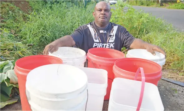  ?? Photo: Ronald Kumar ?? Tacirua Settlment resident, Filimoni Ratoto, waiting for water carting truck following the water cut in Tacirua, Tamavua on April 13, 2023.