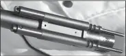  ?? Arkansas Democrat-Gazette/BRYAN HENDRICKS ?? Twin gas pistons straddling the V3’s Light Contour barrel are identical to those in Tremington’s Versa Max, but that is about all the two shotguns have in common.