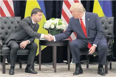  ??  ?? JUST DO AS YOU’RE TOLD: President Donald Trump meets Ukrainian President Volodymyr Zelenskiy during the United Nations General Assembly in New York in September.