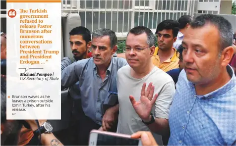  ?? AP ?? ■ Brunson waves as he leaves a prison outside Izmir, Turkey, after his release.