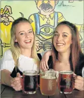  ?? Picture: FREDLIN ADRIAAN ?? BEER ON TAP: Kayla Kurten, 20, left, and Tarryn Meyer, 20, at the German Club’s Oktoberfes­t in Lorraine