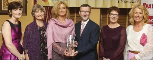  ??  ?? Chief Executive of Wicklow County Council Bryan Doyle presenting the Community Health Award to Antoinette Delamere, Judith Watson, Daphne Smith, Deborah Coughlan and Pauline Newman from the National Learning Network.