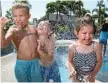  ?? Photo: Rob Williams ?? KEEP COOL: Splashing around at Ipswich’s Splash ‘n’ Play during last year’s summer are (from left) Oliver Thomas, Kaden Matthews and Eva Waterson.