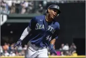  ?? STEPHEN BRASHEAR — THE ASSOCIATED PRESS ?? Seattle Mariners’ Julio Rodriguez celebrates while rounding the bases a three-run home run by Mitch Haniger during the first inning a baseball game against the Cleveland Guardians, Thursday, in Seattle.