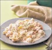  ??  ?? Dilled salmon mac and cheese, featured in Ellen Brown’s new book,“Mac and Cheese,” is an upscale spin on one of America’s favorite comfort foods. CONTRIBUTE­D BY STEVE LEGATO