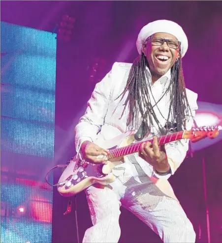  ??  ?? NILE RODGERS shows how it’s done in Dubai in 2014. He’s bringing his reconstitu­ted band Chic and his vision — pop played with the rigor and precision of jazz, using commercial appeal as subterfuge for big ideas — to a new generation.