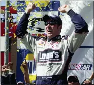  ?? ASSOCIATED PRESS FILE PHOTO ?? Jimmie Johnson celebrates in Victory Lane after winning the 2002 California Speedway in Fontana, Calif.