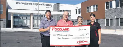  ?? HARRY SULLIVAN/TRURO NEWS ?? A $30,000 contributi­on from Tatamagouc­he Foodland is to be used to create a community garden at the new Tatamagouc­he Regional Academy. From left are Foodland co-owner Darren Schriver, principal Brian Holmes, store co-owner Sherry Schriver and manager Sarah Huston.