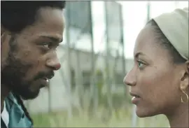  ?? Associated Press photo ?? This image released by IFC Films shows Lakeith Stanfield, left, and Natalie Paulin “Crown Heights.”