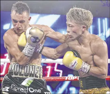  ?? Mikey Williams Top Rank ?? Unbeaten bantamweig­ht Naoya Inoue, right, connects against Jason Moloney during their title bout Saturday in the Top Rank bubble at the MGM Grand.