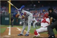  ?? MATT SLOCUM – THE ASSOCIATED PRESS ?? The Los Angeles Dodgers’ Cody Bellinger, left, dodges a pitch from Phillies starter Nick Pivetta during the first inning of a game July 17 at Citizens Bank Park. It would be Pivetta’s last start before being moved to the bullpen.