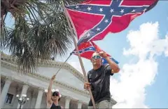  ?? REUTERS ?? In the US, there is a move to ban the flying of the Confederat­e Flag in public because the Confederac­y that lost the American Civil War stood for the perpetuati­on of black slavery