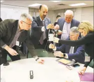  ?? Kin Man Hui / San Antonio Express-News ?? A teambuildi­ng exercise as physicians gather for the first meeting regarding maternal mortality at The Children's Hospital of San Antonio on Jan. 31.