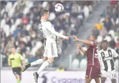  ??  ?? Juventus’ Cristiano Ronaldo scores their first goal. — Reuters photo