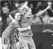  ?? Craig Mitchelldy­er/ISI Photos / Getty Images ?? The Dash’s Allysha Chapman, left, and Rachel Daly celebrate during Wednesday’s win over Portland.