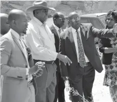  ??  ?? Minister of State for Matabelela­nd North Provincial Affairs Cain Mathema (third from right) shows the dam site to Vice President Phelekezel­a Mphoko (centre) and investors Mr Koketso Molefi, Mr Felix Maziya (partly obscured) and Hwange District...