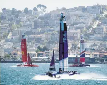  ?? Noah Berger / Associated Press ?? SailGP teams from France, Great Britain and China practice Tuesday. The foiling catamarans will compete this weekend.