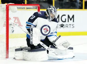  ?? MARK HUMPHREY / THE ASSOCIATED PRESS ?? Winnipeg goalie Connor Hellebuyck, a Vezina Trophy finalist, may not win the award by season’s end, but could be lifting an even bigger prize if the Jets eliminate Nashville.