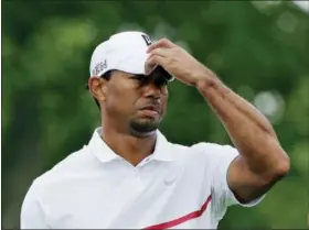  ?? DARRON CUMMINGS — THE ASSOCIATED PRESS ?? Tiger Woods shot an 85 on Saturday at the Memorial for the worst score of his career.