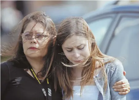  ?? AP PHOTOS ?? GRIEF-STRICKEN: Mourners leave the funeral of Alaina Petty, in Coral Springs, Fla., yesterday. Petty was a victim of Wednesday’s mass shooting at Marjory Stoneman Douglas High School in Parkland, Fla.