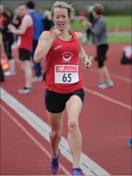  ??  ?? Mary Leech en route to national gold medal in the 3000m.