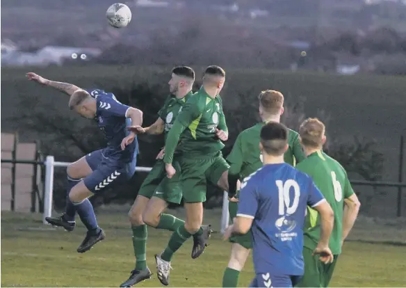  ?? ?? Easington CW (green) in action against Jarrow at Easington Welfare Park, on Saturday.