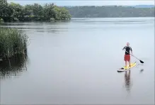  ?? METROLAND FILE PHOTO ?? Standup paddling, a sport growing in popularity, is part of the new Kawartha Paddle Quest event coming to Little Lake.