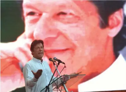  ?? APP ?? Pakistan Tehreek-e-Insaaf (PTI) chairman Imran Khan addressing a workers’ convention at the Convention Centre in Islamabad. —