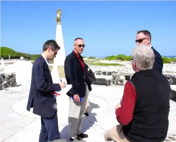  ?? — AFP photo ?? Dunford (back to camera) speaks to reporters on Wake Island.