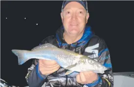  ?? ?? Brett with a solid Whiting caught on a recent trip up the Nerang River.