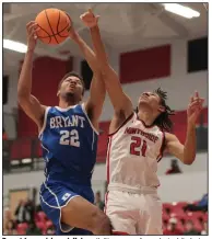  ?? Democrat-Gazette/Shawn Cossey) ?? Bryant forward Joseph Nelson (left) goes up for a shot while being guarded by Fort Smith Northside’s Marco Smith on Saturday during the Hornets’ 59-56 victory over the Grizzlies in The Big Show Tip-Off at Northside Arena in Fort Smith.
(Special to the NWA