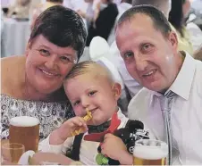  ??  ?? Thomas with his late grandma Susan Carol Banks and grandad Gordon.