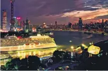  ?? PROVIDED TO CHINA DAILY ?? A cruise ship anchors at a terminal at the Bund of Shanghai in March.