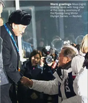  ?? — Reuters ?? Warm greetings: Moon (right) shaking hands with Yong-chol at the closing ceremony of the Pyeongchan­g Winter Olympic Games.