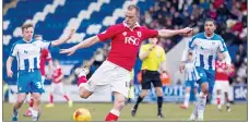  ??  ?? DENIED: Aaron Wilbraham buries what he thought was the equaliser only for it to be chalked off