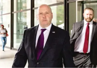  ?? ASHLEE REZIN GARCIA/ SUN- TIMES ?? State Sen. Thomas Cullerton walks out of the Dirksen Federal Courthouse in August after pleading not guilty to federal charges he had been a ghost payroller for the Teamsters.