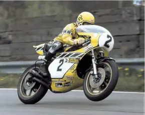  ??  ?? The front wheel lifts as Kenny Roberts pushes the TZ750 hard