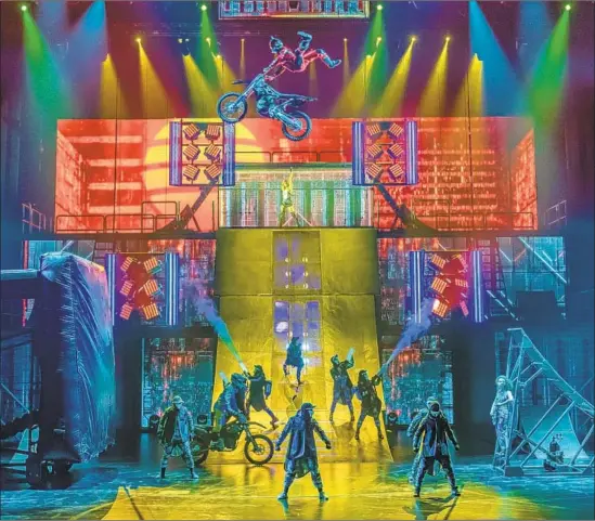  ?? Matt Beard ?? HIGH-FLYING motorcycli­sts, gang warfare and a gritty love story make up the latest Cirque du Soleil show “R.U.N,” with a script by filmmaker Robert Rodriguez.